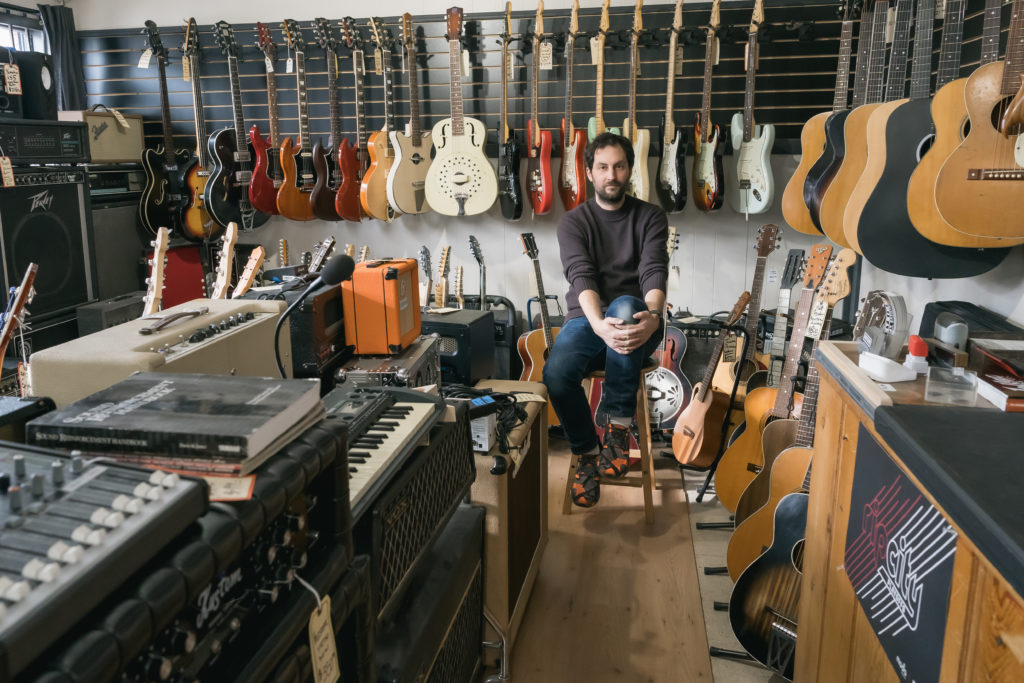 Hank Failing with guitars.