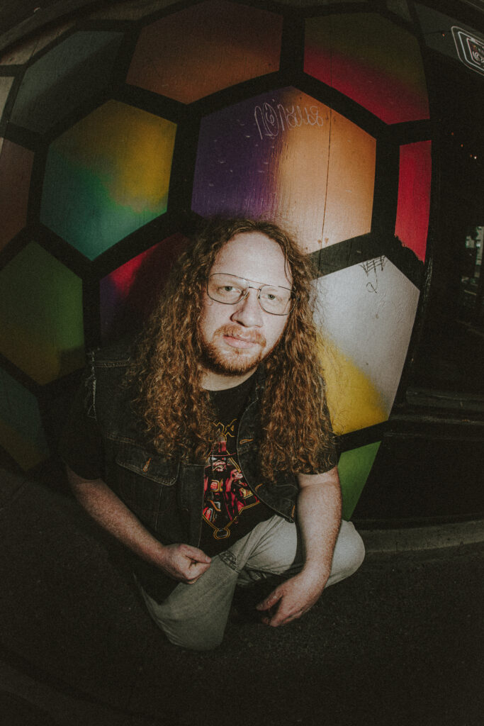 Braden Boardman poses, showing off his hair at Shanghai Tunnel Bar